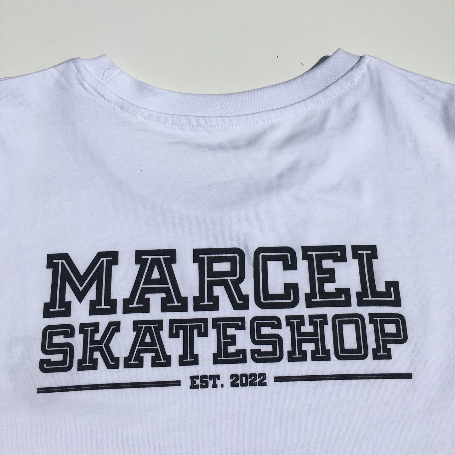 MARCEL - SHOP LOGO TEE BACKPRINT - WHITE/BLACK