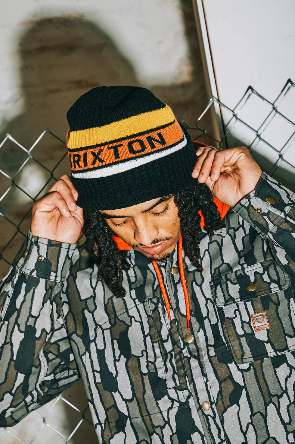 BRIXTON - RAINIER STRIPED BEANIE - BLACK/YELLOW/ORANGE